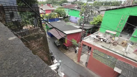View from the top of a densely populated area in Jakarta Stock Footage 233667022
