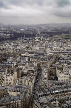 The view from the top of the eiffel tower, with a plane on Stock Photos