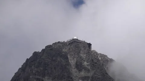 A view of the top of Lomnicky peak, on which there is a cable car station Stock Footage 278469401
