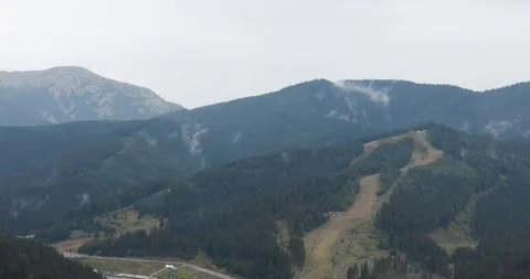 View from top of mighty mountains with clouds after rain. Fascinating view of Stock Footage 138166231