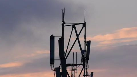 A view of the top of a mobile tower during sunrise time Stock Footage 134636561
