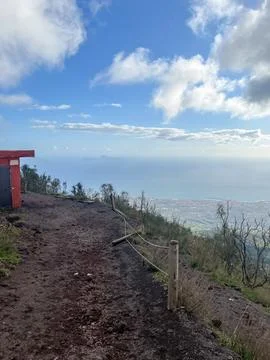 View from the top of Mount Vesuvius overlooking the sea and coastal city thro Stock Photos