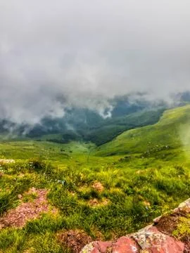 View from a top of the mountain on a cloudy day Stock Photos