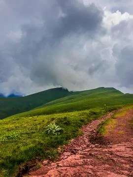 View from a top of the mountain on a cloudy day Stock Photos