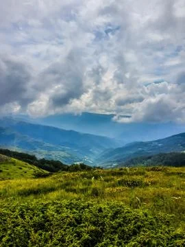 View from a top of the mountain on a cloudy day Stock Photos