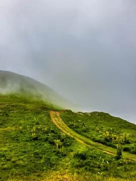 View from a top of the mountain on a cloudy day Stock Photos
