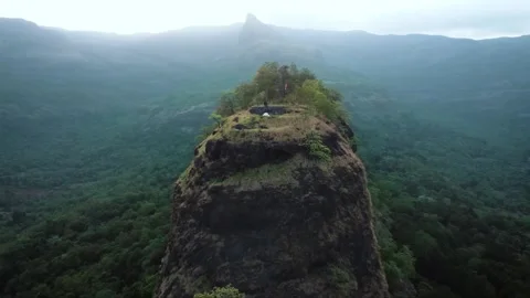 View from the top of the mountain, Drone Footage of Tall Sandy Rock Mountain Stock Footage 284711301