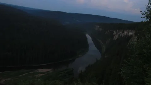 The view from the top of the mountain to the forests and the river. Stock Footage 136165697