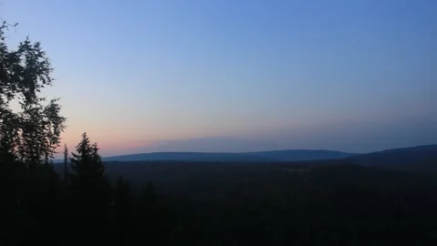 The view from the top of the mountain to the forests and the river. Stock Footage