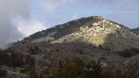 View of the top of the mountain illuminated by the sun Stockbeeldmateriaal 279026022
