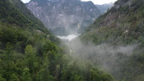 View from the top of a mountain. Mountain landscape in Austria, fog and clouds,  Stock Footage 294348295