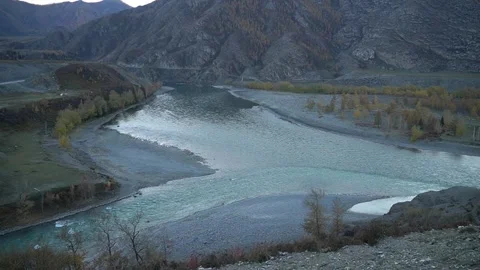 View from the top of the mountain. Rivers with blue clear water in autumn season Stock Footage 265016801