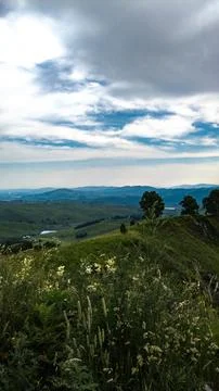 View from the top of the mountain to the valley 写真素材