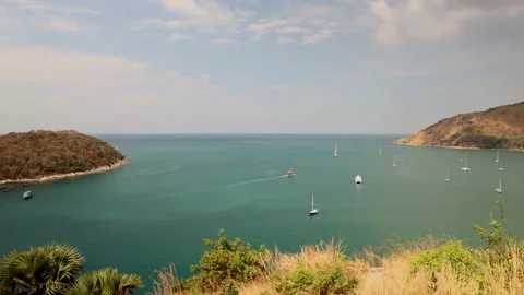 View from the top point to blue sea which surrounds the hills 스톡 동영상 145436880