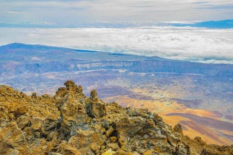 View from top of Teide volcano with clouds in Tenerife, Spain Stock Photos
