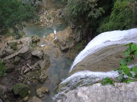 View from top of the waterfall down to lake in a middle tropical jungle Stock-Footage 71422727