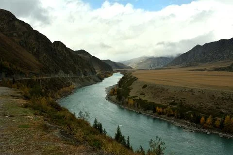 View from the top of the wide winding bed of a beautiful turquoise river fl.. Stock Photos