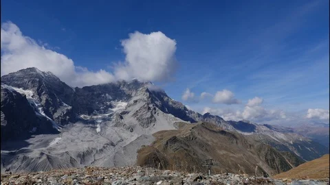 View of the tops of the mountains with the clouds flowing Stock Footage 95839687