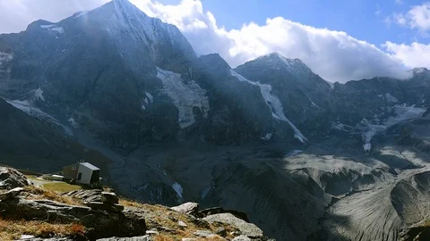 View of the tops of the mountains with the clouds flowing Stock Footage 95879929