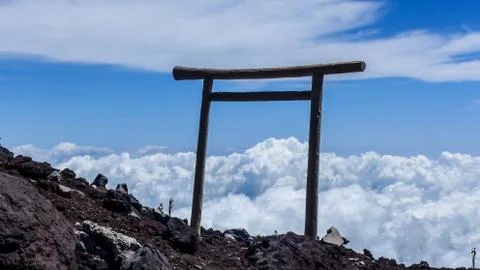 View of Torii on blue sky with cloud looking from the top of Fuji mountain in Stock Photos