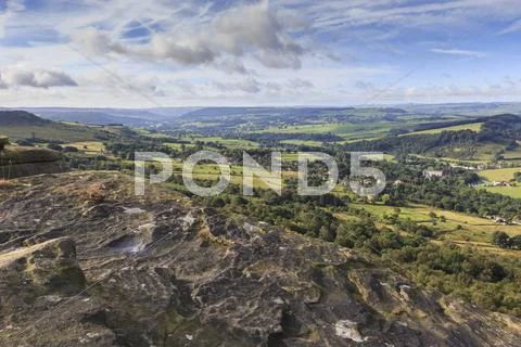 View towards Chatsworth from Curbar Edge, with Calver and Curbar villages, Peak Stock Photos