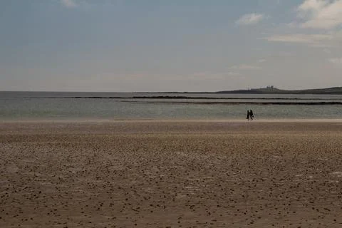 View towards Dunstanburgh from Beadnell Stock Photos