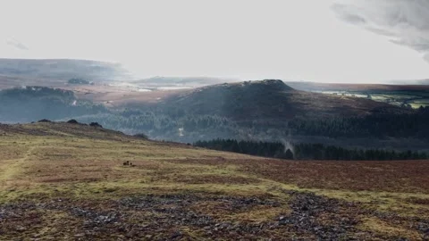 View towards the morning sun from Sharpitor on Dartmoor Stock Footage 327207298