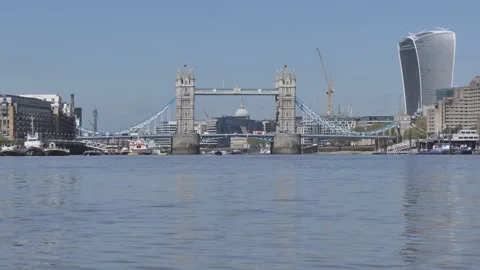 A view of the Tower bridge and River Thames with an approaching boat. Stock Footage 280929820