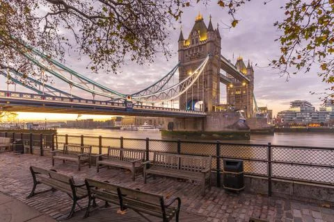 View of Tower Bridge and River Thames with dramatic sky at sunrise, London, 스톡 사진