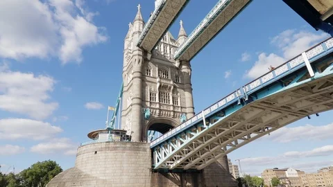 View of Tower Bridge in London from underneath travelling down the river thames Stock Footage 121888870