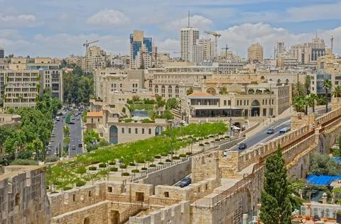 View of the Tower of David courtyard and new Jerusalem in the background Stock Photos