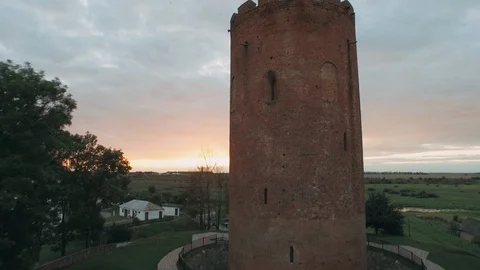 View Of Tower Of Kamyenyets In Sunset Or Sunrise Time. Bird on the battlement Stock Footage 114128985