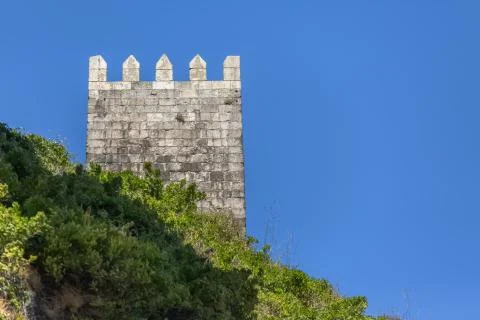 View of tower on medieval wall in granite stone, on Porto, Portugal Stock Photos
