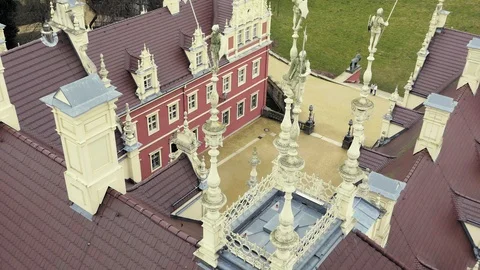 View from tower on roof of classicist castle with red facade Vídeo Stock 89771631
