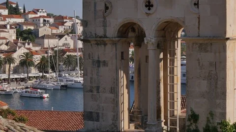View of town and Church Bell Tower, Hvar, Hvar Island, Dalmatia, Croatia, Europe Stock Footage