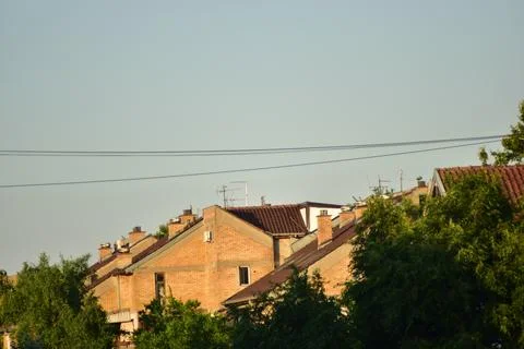 View of the town behind trees Stock Photos
