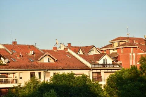 View of the town behind trees Stock Photos