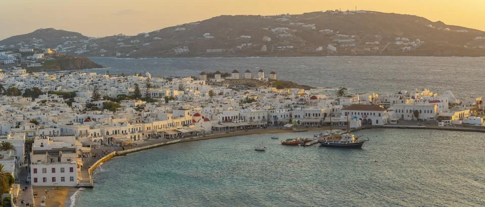 View of town from elevated view point at sunset, Mykonos Town, Mykonos, Cyclades Stock Photos