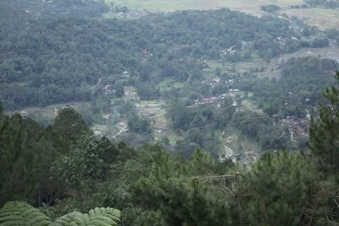 A view of a town from a hilltop Stock Photos