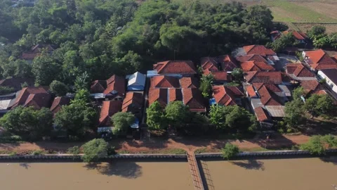 A view of a town with a river running through it Stock Footage 319031909