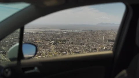 View of town through car window on top of mountain in Trapani, Sicily Stock Footage 114505146