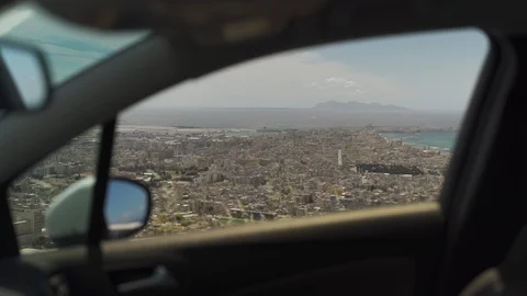 View of town through car window on top of mountain in Trapani, Sicily Stock Footage 117408543