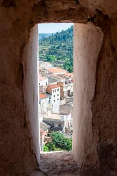 View of a town through the window of a castle Stock Photos