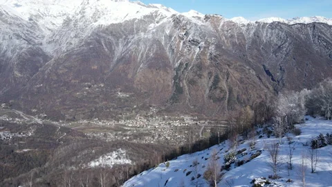 View to the town into the valley from the peak of the mountain, winter, alps 4k Stock Footage 149425620