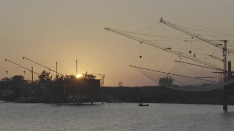 View of the Trabucco at sunset, Comacchio, Po delta, Italy Stock Footage 155862794