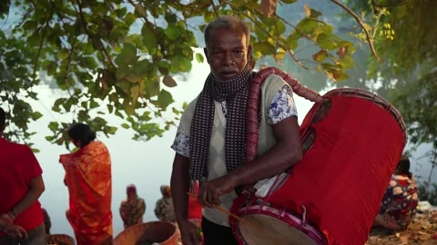 View of a traditional drummer with a large red drum, Bangladesh. 스톡 동영상 334988704