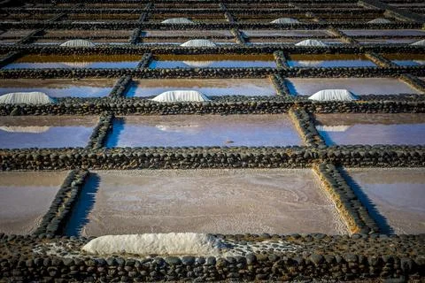 View on traditional rectangular salt evaporation ponds or salt pans creatin.. Stock Photos