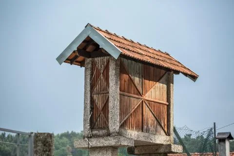 View of traditional warehouse to store corn, typical in Portugal Stock Photos