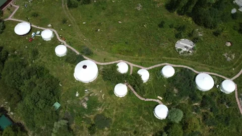 View of traditional yurt campsite layout and glamping resort Kazakhstan Stock Footage 340550698