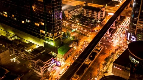 View on Traffic and Architecture in Bangkok at night Stock Footage